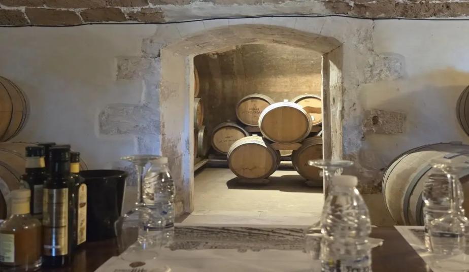 Olive oil and wine of Agia Triada Monastery in the cellar, Chania, Crete