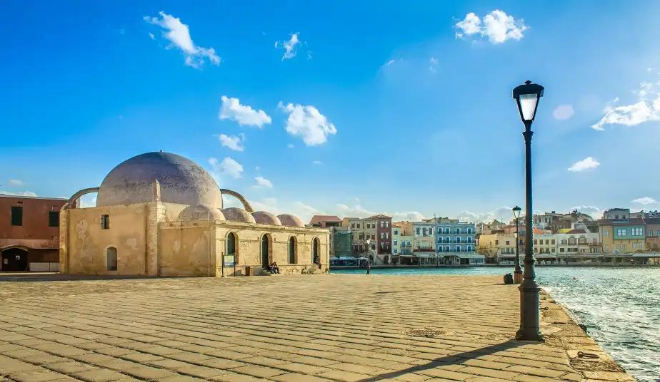 The waterfront mosque and the Venetian harbor of Chania, Crete
