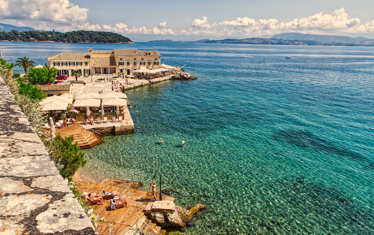 Corfu beaches crystal clear water coastline Greece